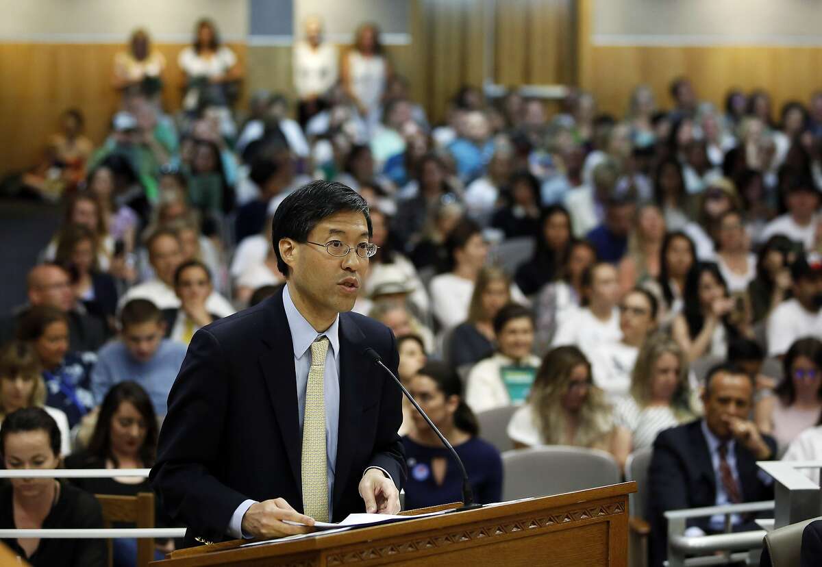 FILE - In this April 24, 2019, file photo, state Sen. Dr. Richard Pan, D-Sacramento, urges lawmakers at the Capitol, in Sacramento, Calif., to approve his proposal to give state public health officials oversight of doctors who grant more than five medical exemptions annually and schools with vaccination rates less than 95%. California lawmakers will return after their summer recess, Monday, Aug. 12, 2019, with one month left to pass bills before adjourning for the year. Among the legislation still to be decided on are Pan's vaccination bill SB276. (AP Photo/Rich Pedroncelli, File)