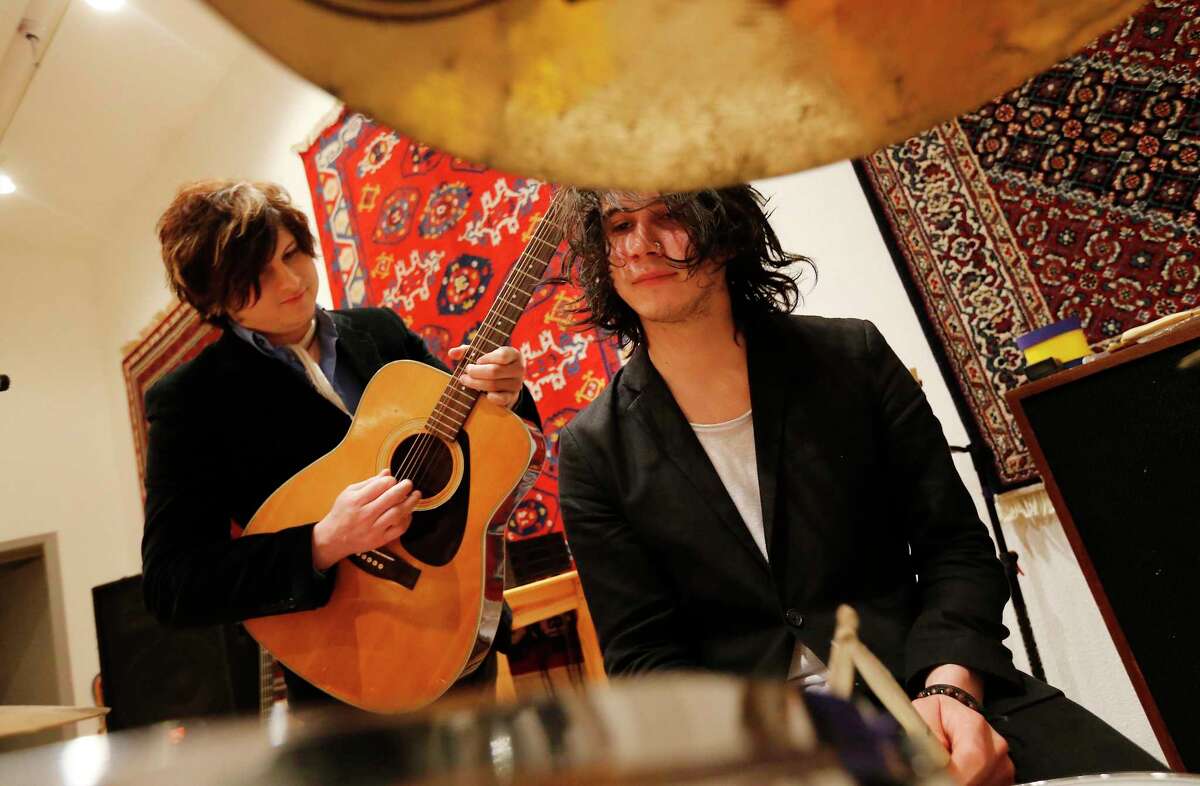 Diego (right) and Emilio Navaira IV show off their music skills as part of The Last Bandoleros.