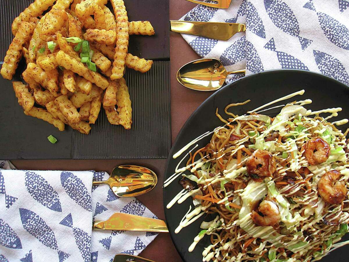 The menu includes spiced fries called Wolf Potato, upper left, and a shrimp yakisoba noodle dish at Blue Whale.