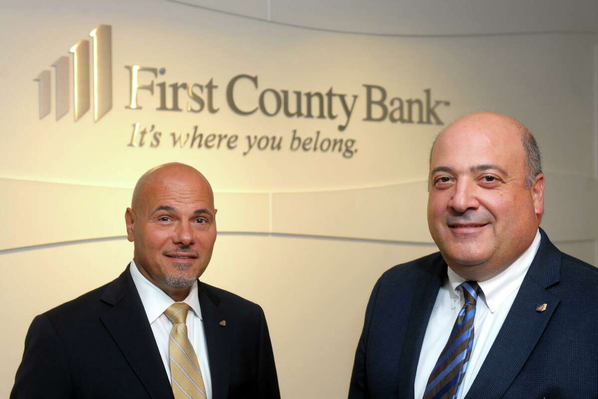 Robert Granata, right, Chairman and Chief Executive Officer of First County Bank, and Willard Miley, the bank’s President and Chief Operating Officer pose in the bank’s headquarters in Stamford, Conn. Aug. 21, 2019.