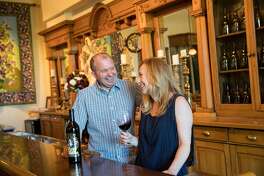 Miles Berghold (left) and Julia Berghold (right) pose for a portrait in the tasting room at Berghold Vineyards in Lodi, Calif., on Friday, August 16, 2019.