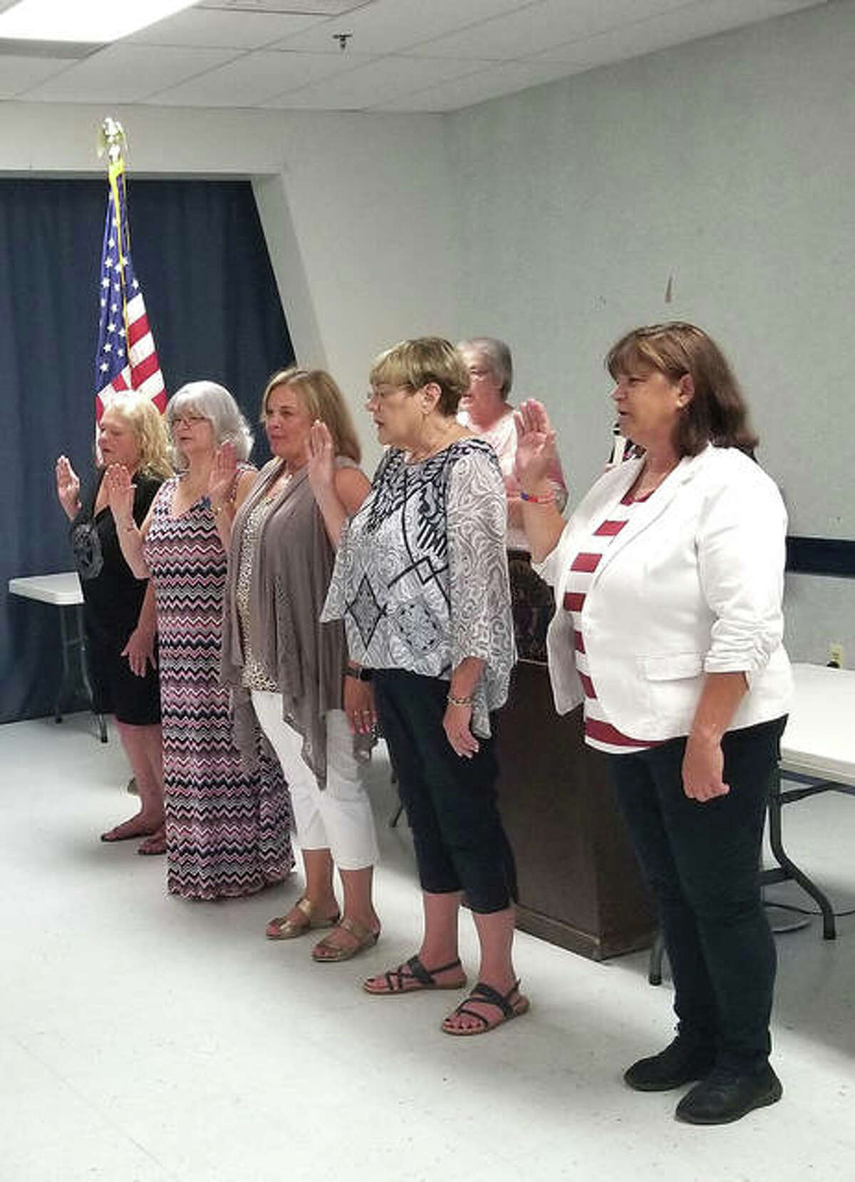 New officers for the Edwardsville American Legion Post #199 Auxiliary are sworn in during the installation ceremony on Sunday.