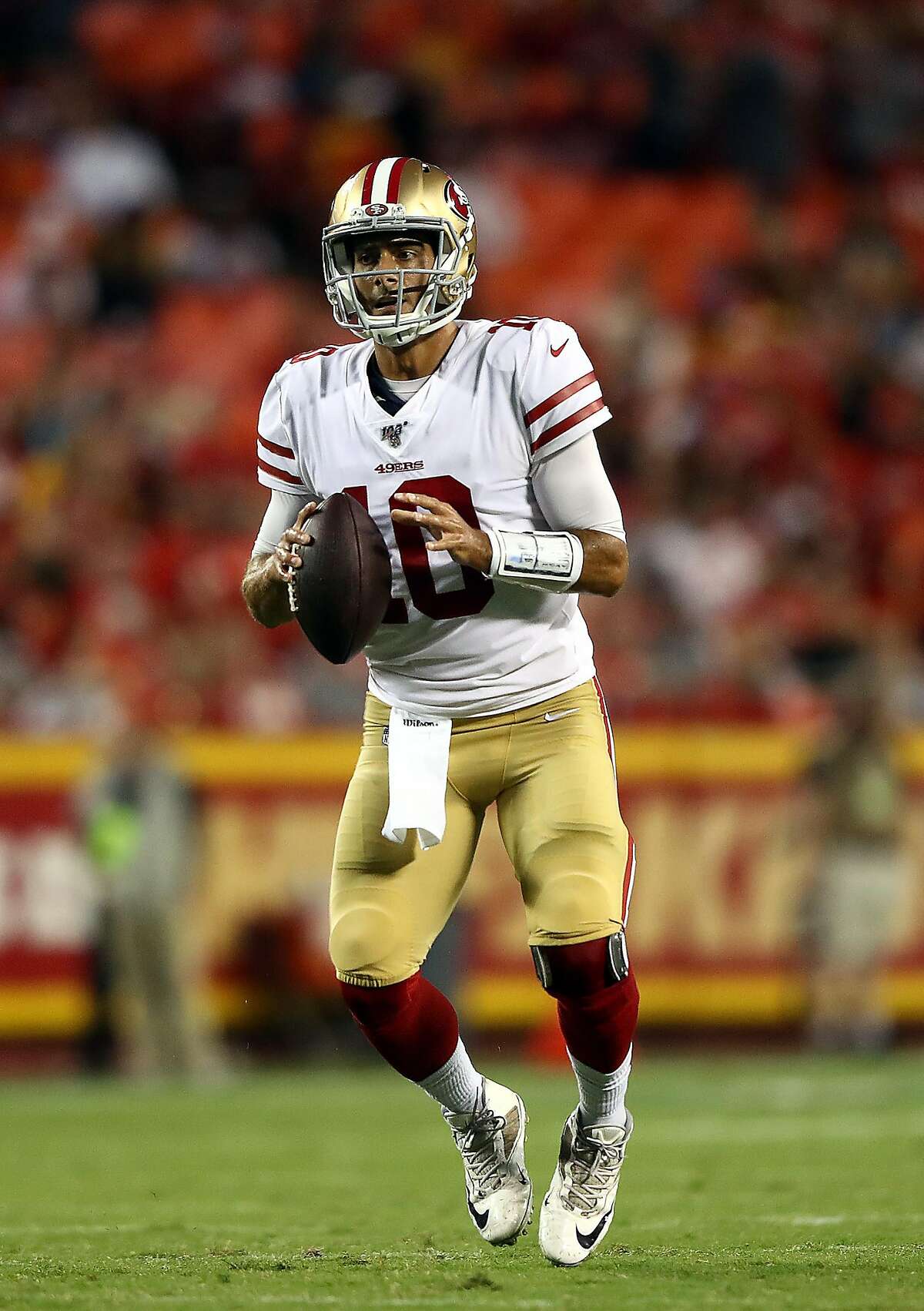 Quarterback Jimmy Garoppolo #10 of the San Francisco 49ers looks to pass during the preseason game against the Kansas City Chiefs at Arrowhead Stadium on August 24, 2019 in Kansas City, Missouri. (Photo by Jamie Squire/Getty Images)