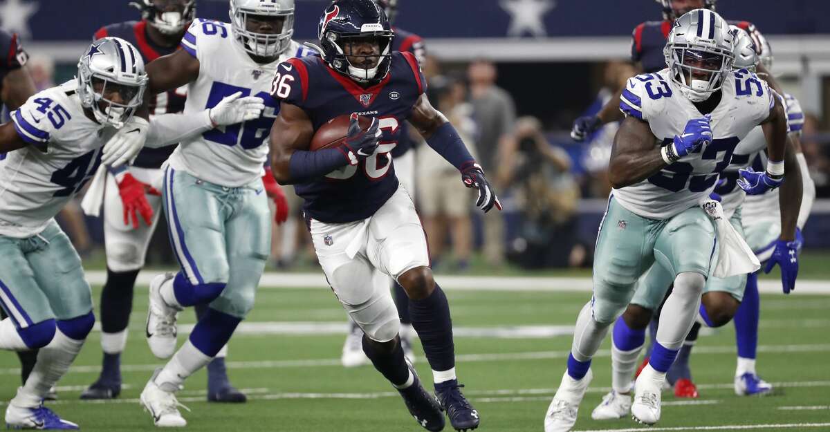 Houston Texans running back Damarea Crockett (36) runs the ball past Dallas Cowboys linebacker Justin March-Lillard (53) during the second quarter of an NFL preseason football game at AT&T Stadium on Saturday, Aug. 24, 2019, in Arlington, Texas.