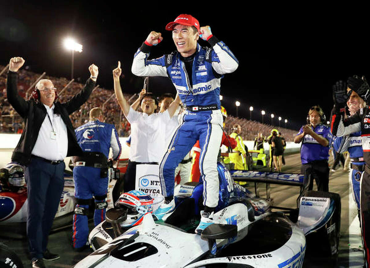 Takuma Sato celebrates after winning an IndyCar race at World Wide Technology Raceway on Saturday night in Madison.