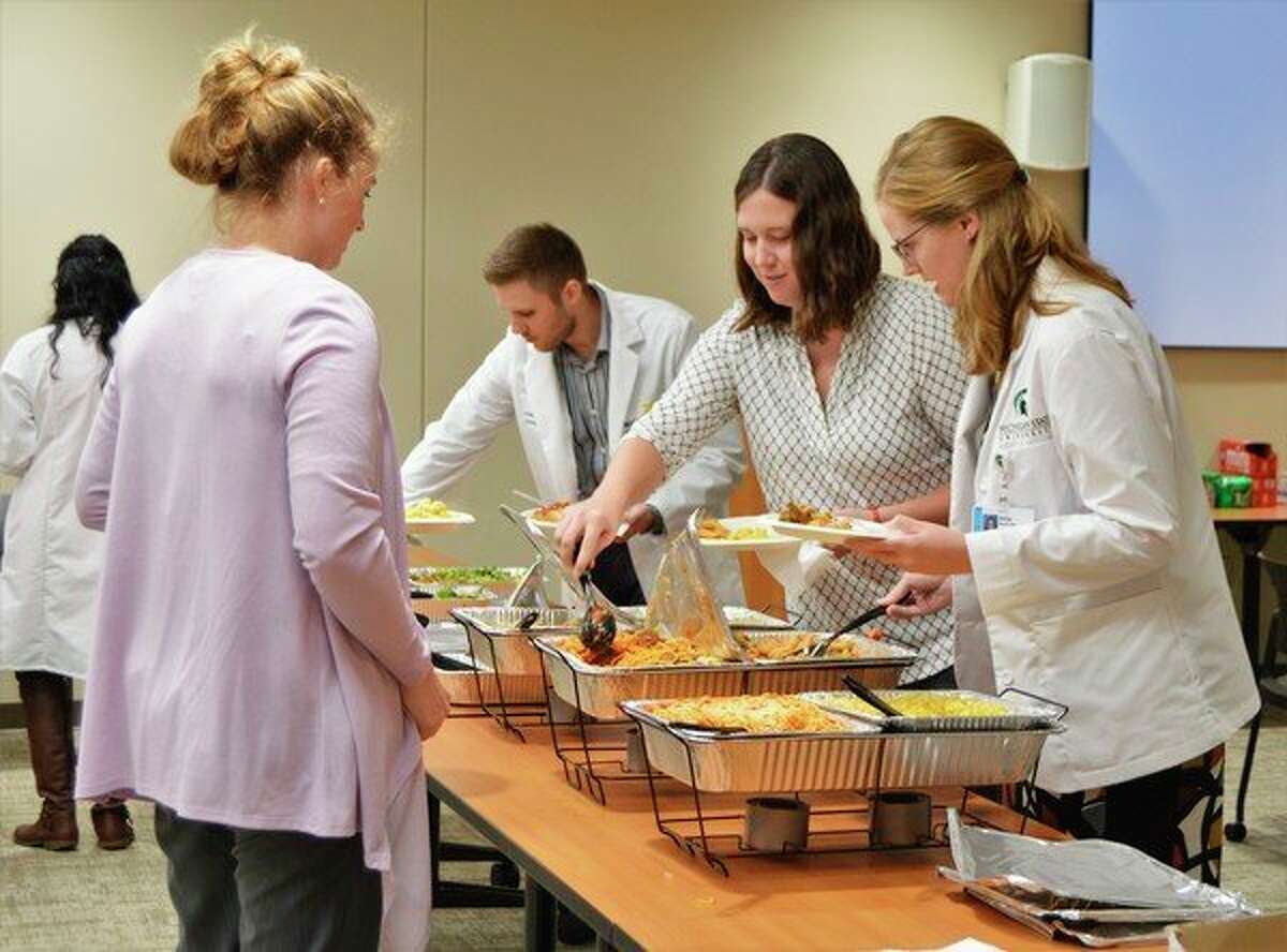 A luncheon was held in Midland to welcome the 12 new medical students from Michigan State University's College of Human Medicine. (Ashley Schafer/ashley.schafer@hearstnp.com)