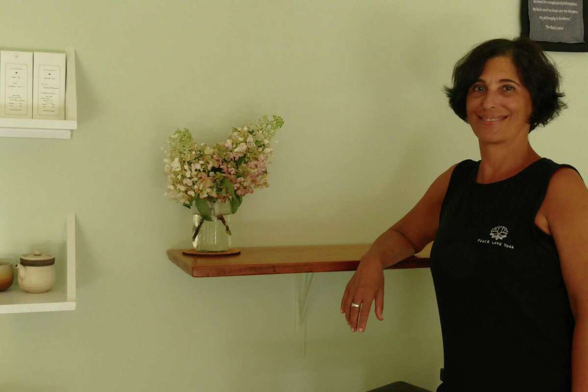 Nancy Volante inside her Imagine Yoga studio on Roberts Lane. Volante teaches restorative and vinyasa yoga.