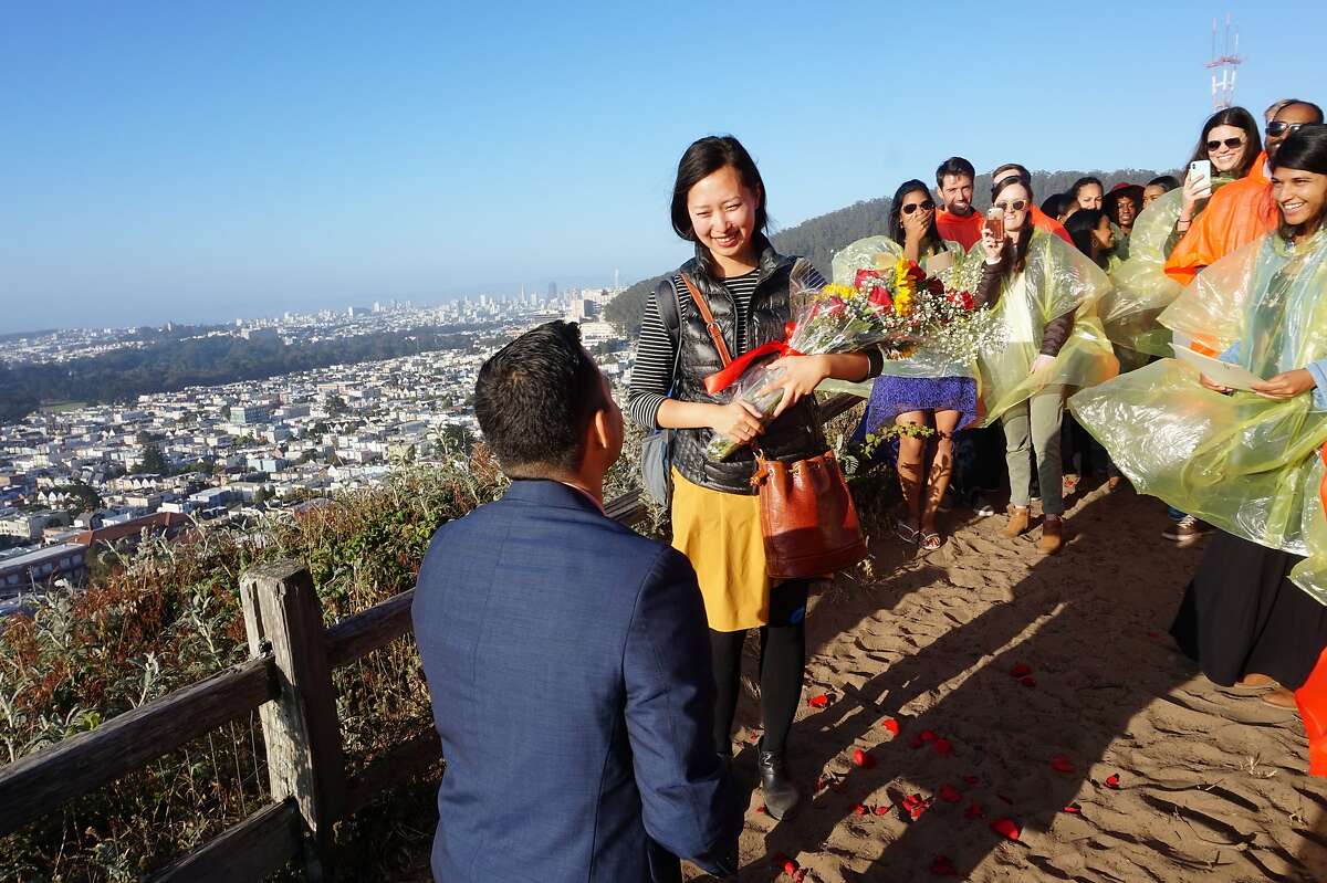 Peter Movilla proposes to Jennifer Wang atop the 16th Avenue tiled steps. The couple met in an UberPool.