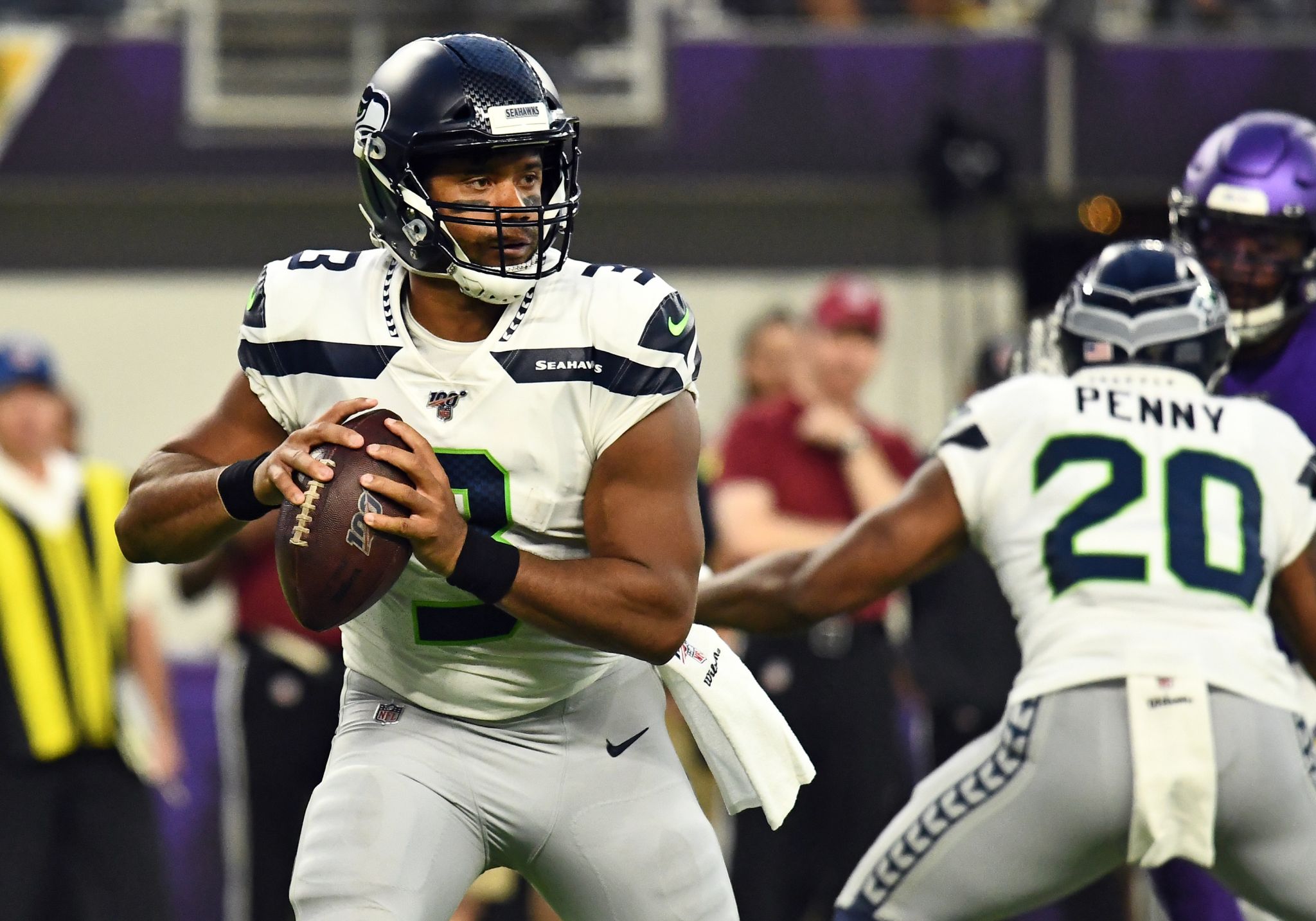 Seattle Seahawks defensive back Marquise Blair, right, hits Denver Broncos  wide receiver Nick Williams, drawing a penalty flag for unnecessary  roughness, during the second half of an NFL football preseason game,  Thursday