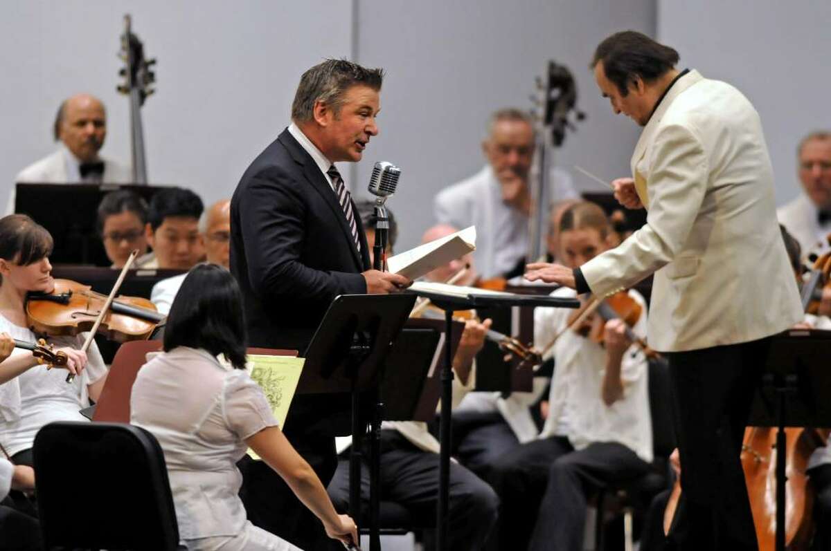 Alec Baldwin narrates ?Lincoln Portrait? as Charles Dutoit conducts during opening night of the Philadelphia Orchestra at the Saratoga Performing Arts Center in Saratoga Springs, NY on August 5, 2009. (Lori Van Buren / Times Union)
