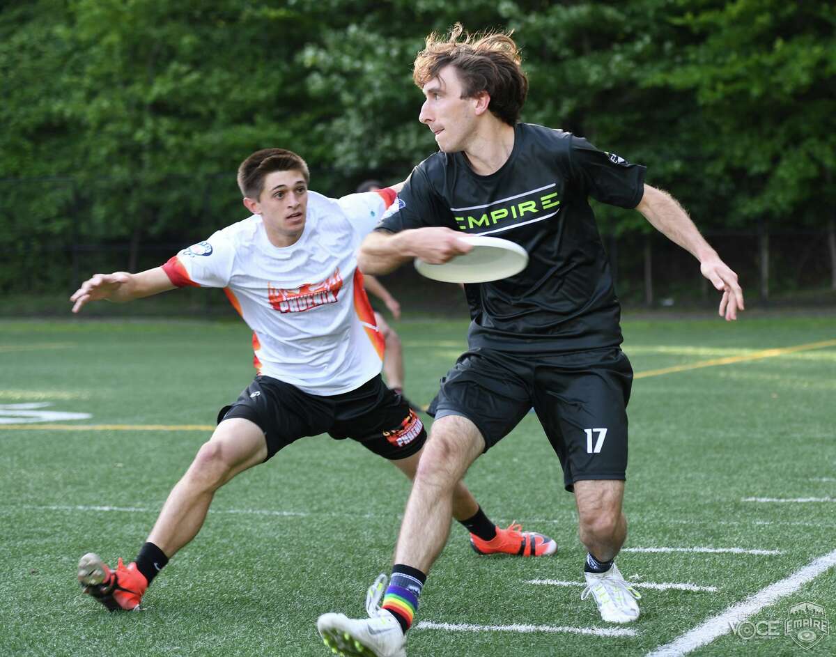 Greenwich resident Matt Stevens, right, was one of the top players on the New York Empire that won the American Ultimate Disc League championship on Aug. 11, 2019, in San Jose, California.