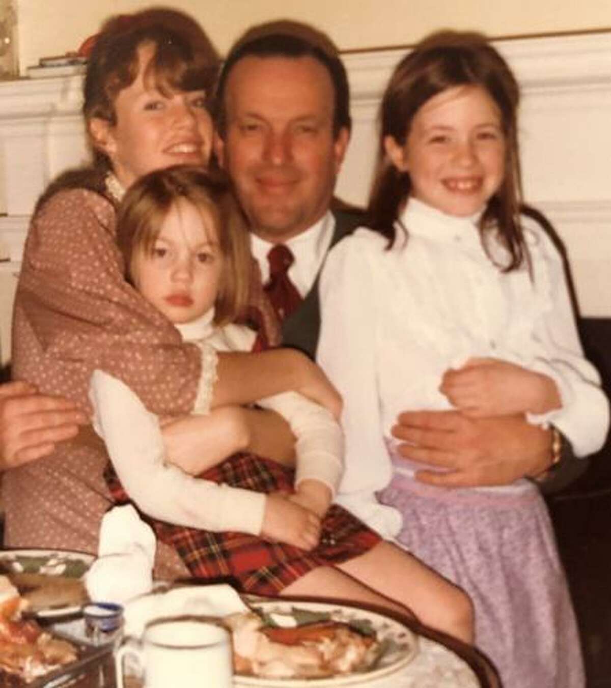 Cheever Tyler, shown with his daughters, from left, Haven, Sara and Katherine in about 1980, helped save the financially troubled Shubert Center for the Performing Arts in the 1980s and served as a civic cheerleader for New Haven. He died Friday at 81.