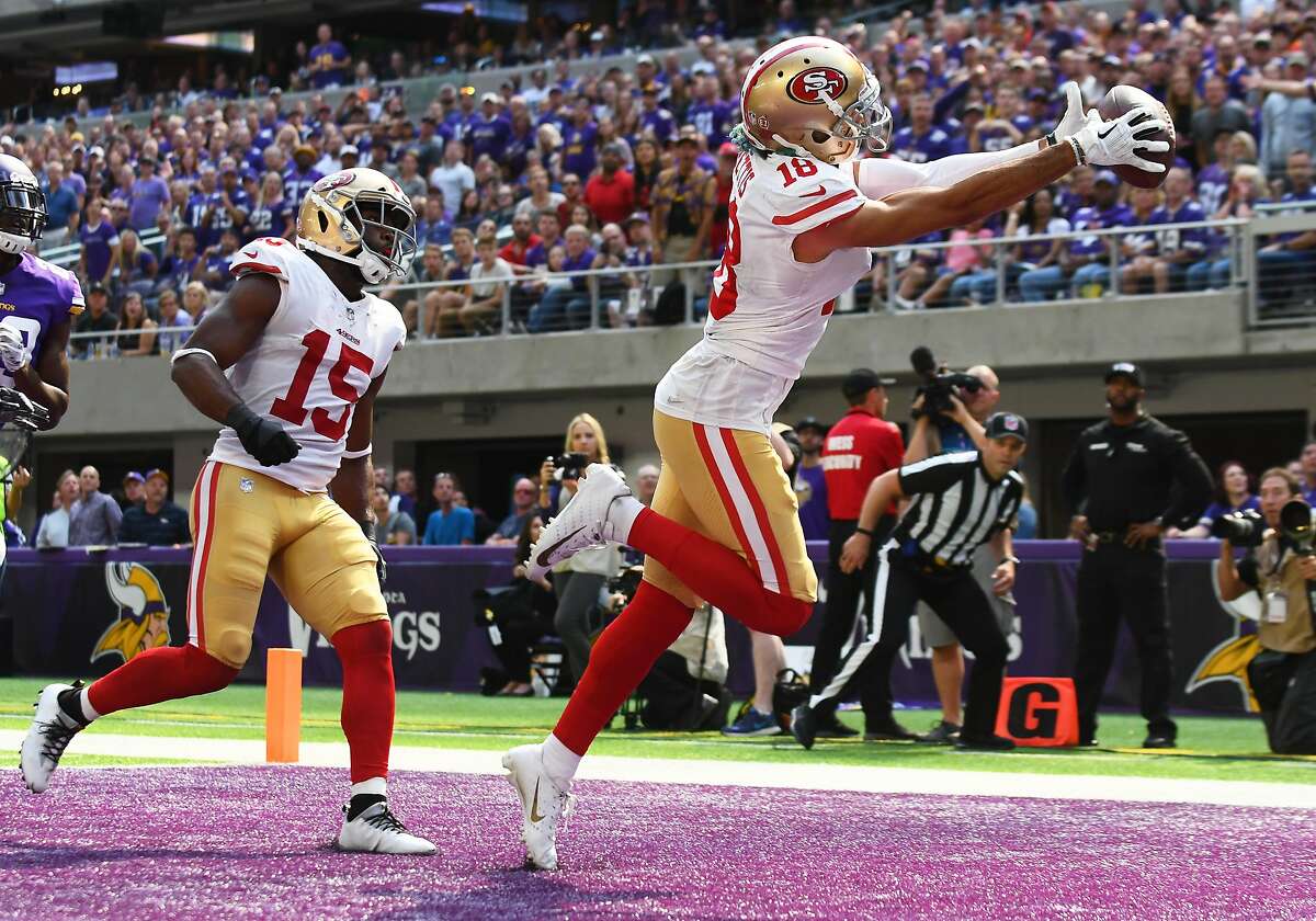 MINNEAPOLIS, MN - SEPTEMBER 09: San Francisco 49ers Wide Receiver Dante Pettis (18) catches a pass from San Francisco 49ers Quarterback Jimmy Garoppolo (10) for a touchdown in the 3rd quarter during an NFL game between the Minnesota Vikings and the San Francisco 49ers on September 9, 2018 at U.S. Bank Stadium in Minneapolis, Minnesota. The Vikings defeated the 49ers 24-16.(Photo by Nick Wosika/Icon Sportswire via Getty Images)