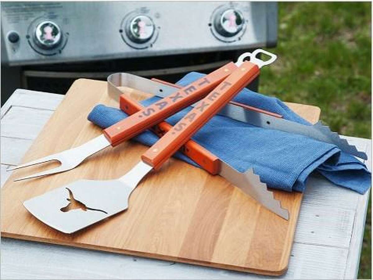 A custom grill set tells guests what the grill master is rooting for.