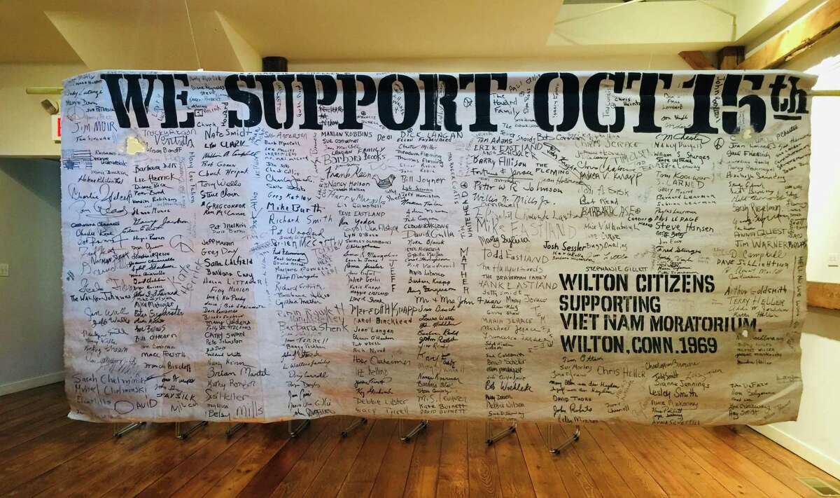 A protest banner in support of the Oct. 15, 1969 national moratorium on the Vietnam War, is on display at the Wilton Historical Society. The banner was signed in Wilton by more than 400 people of all ages.