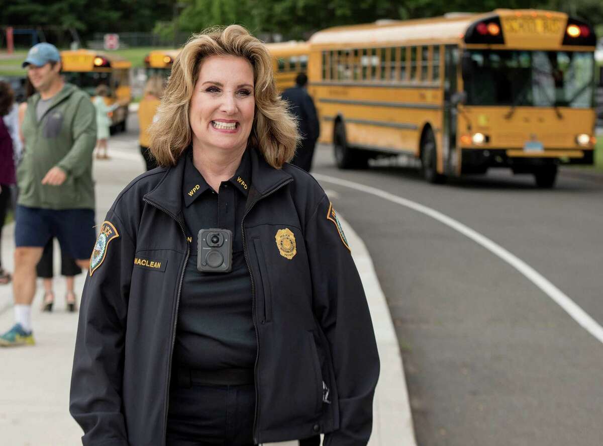 Wilton School Resource Officer Diane Maclean greeted Miller-Driscoll students on the first day of school on Aug. 27. She has announced her retirement effective Oct. 1.