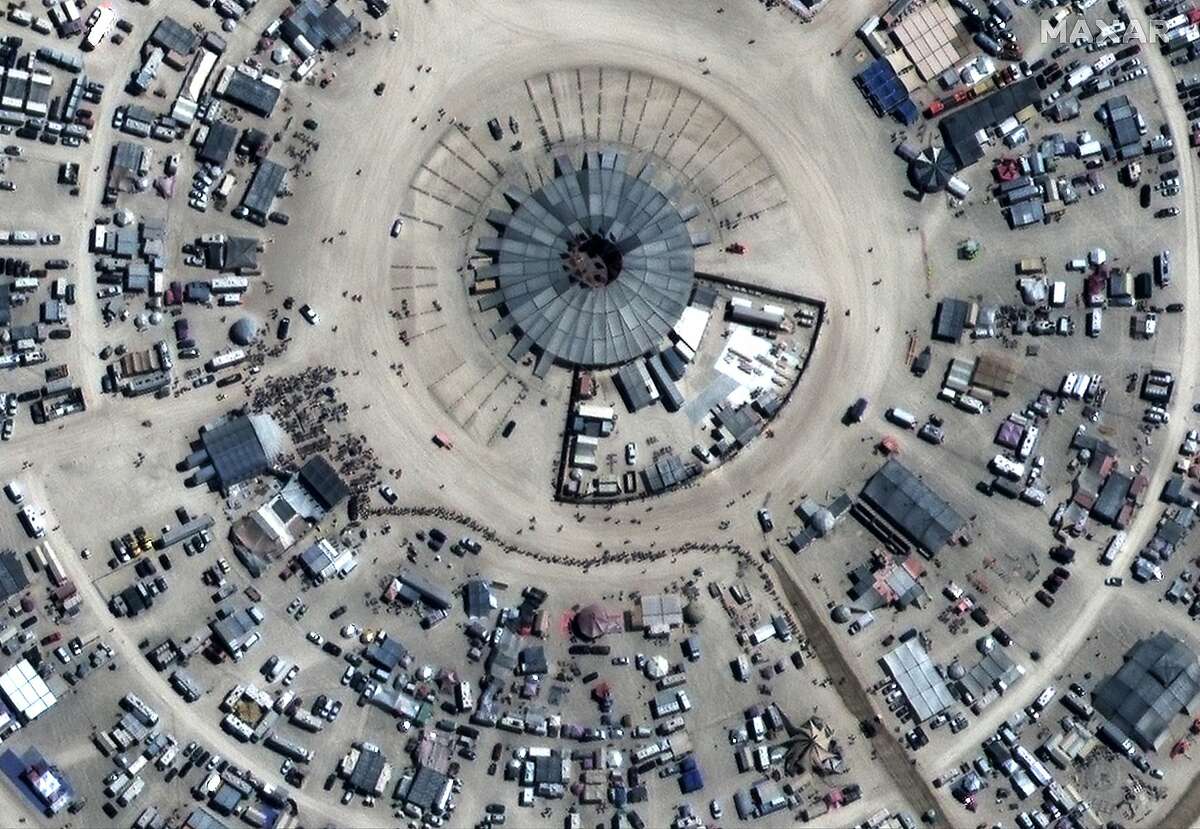 This Sunday, Aug 25, 2019, satellite image provided by Satellite image ©2019 Maxar Technologies shows a view over the Burning Man Festival in Gerlach, Nev. (Satellite image ©2019 Maxar Technologies via AP)