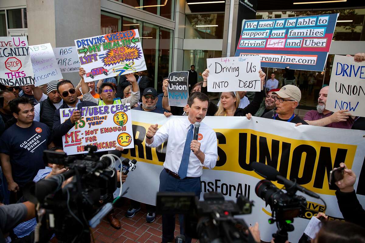 Presidential candidate Pete Buttigieg speaks during a protest outside of Uber's Headquarters on Market Street in San Francisco, Calif. on Tuesday, August 27, 2019. Tuesday's protest is part of a three-day drive from Los Angeles to Sacramento to advocate for bill AB5 that would classify gig workers as employees.