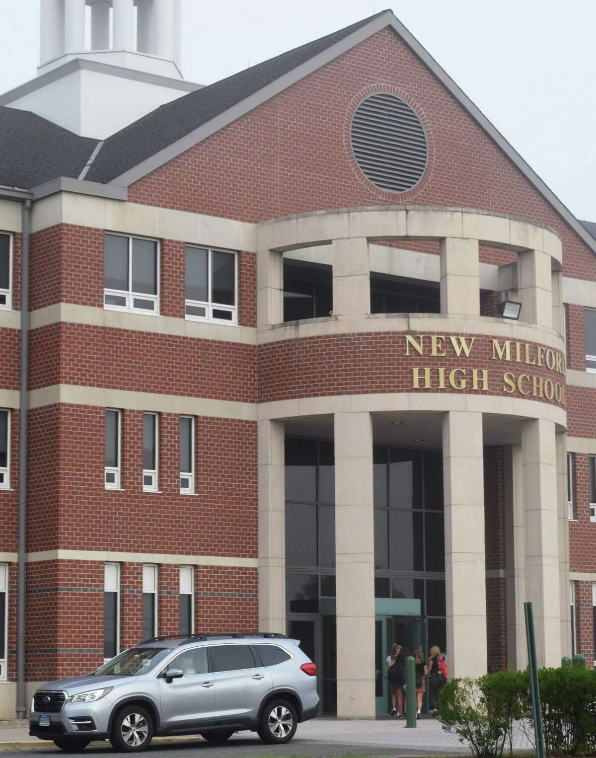 Spectrum/New Milford students headed back to school Tuesday, Aug. 27, 2019. Many high school students are dropped off in front of the school for the first day.