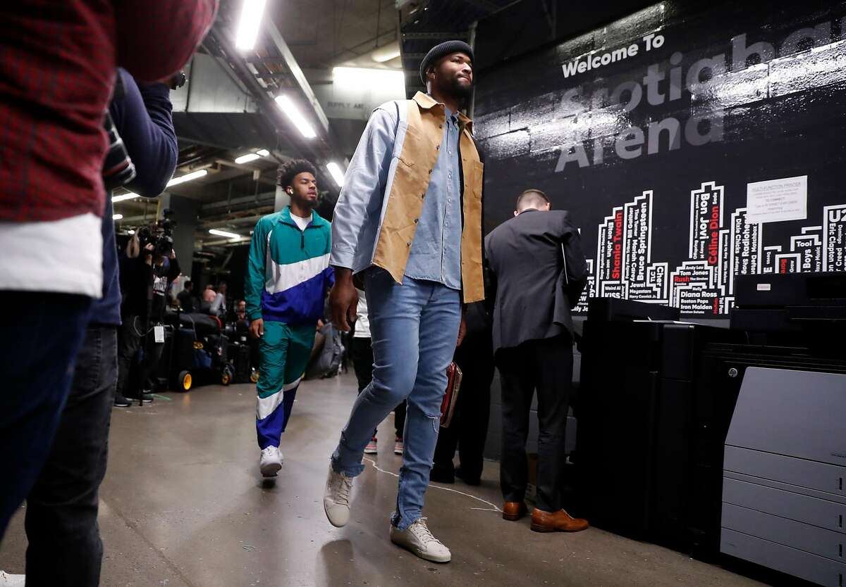 Golden State Warriors' DeMarcus Cousins and Quinn Cook arrive before playing Toronto Raptors in NBA Finals' Game 5 at Scotiabank Arena in Toronto, Ontario, on Monday, June 10, 2019.