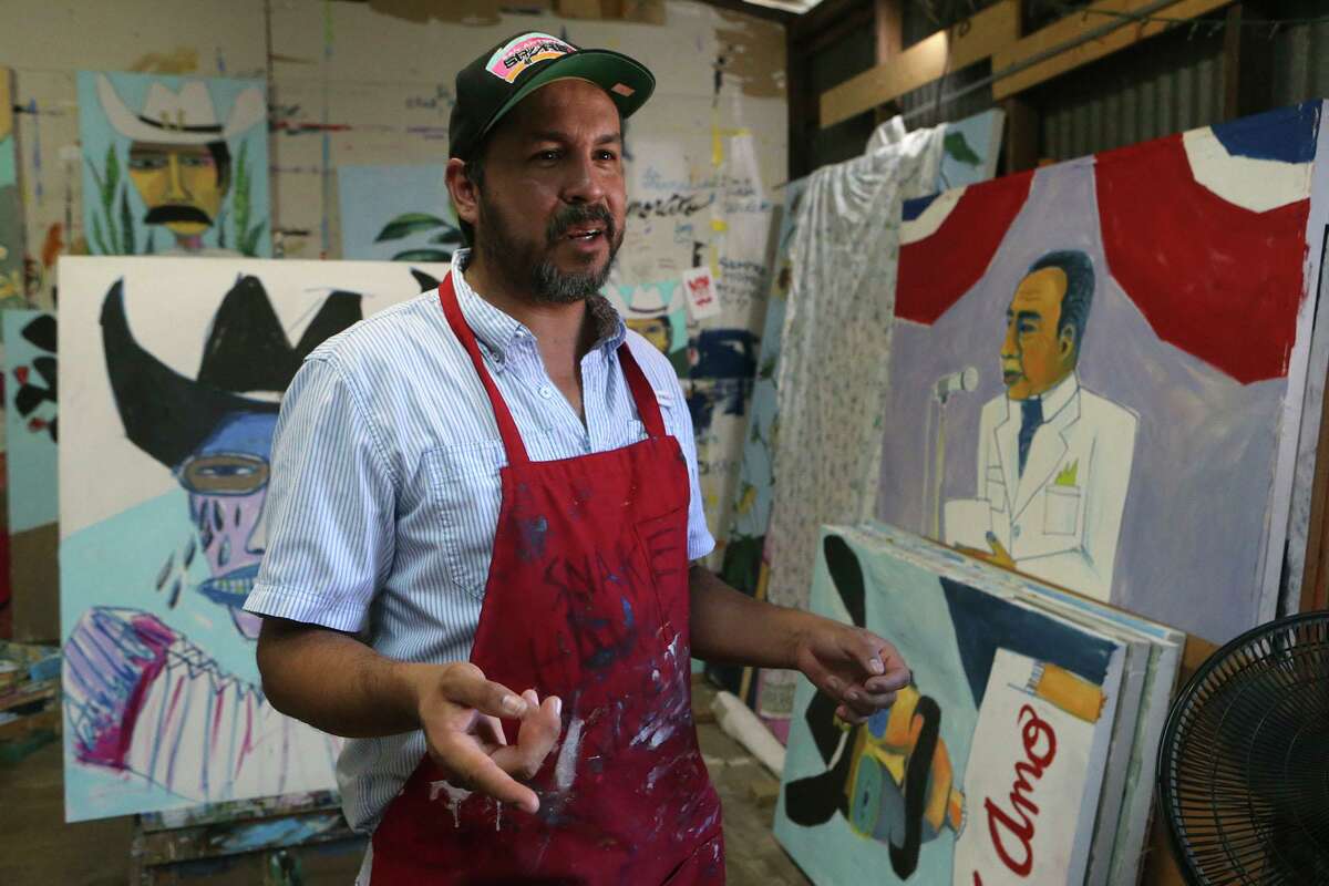 Local artist Cruz Ortiz speaks in his studio Monday September 19, 2016 about the art work he has created that will be used by Hillary Clinton's presidential campaign.
