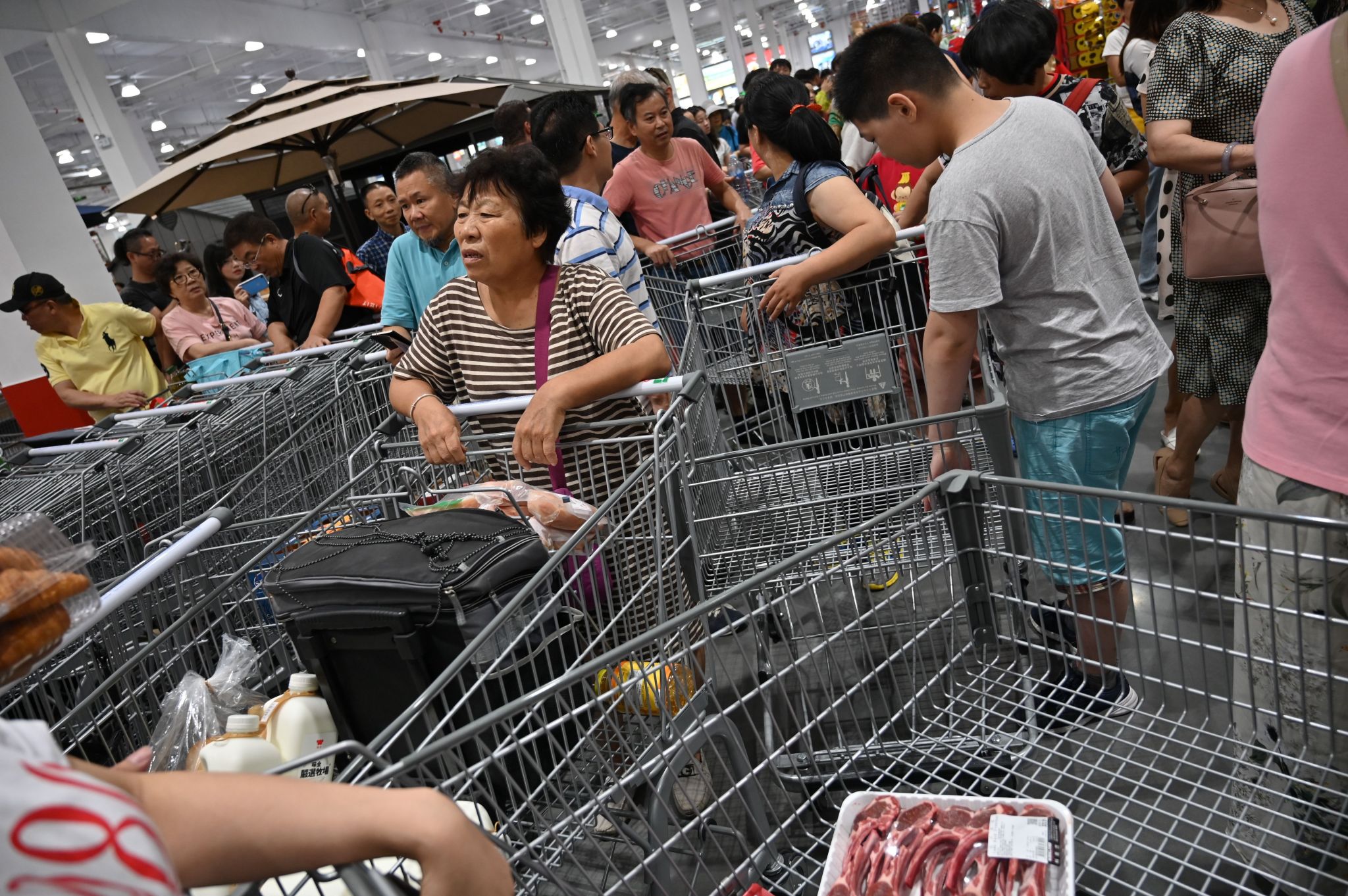 China's first Costco steps up crowd control after chaotic opening day