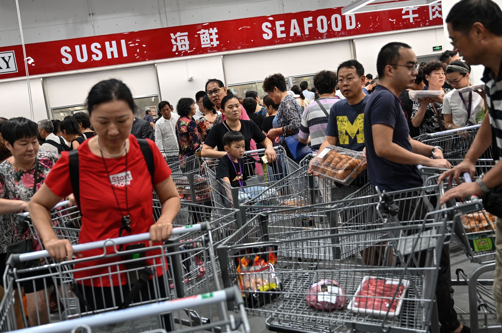 China's first Costco steps up crowd control after chaotic opening day