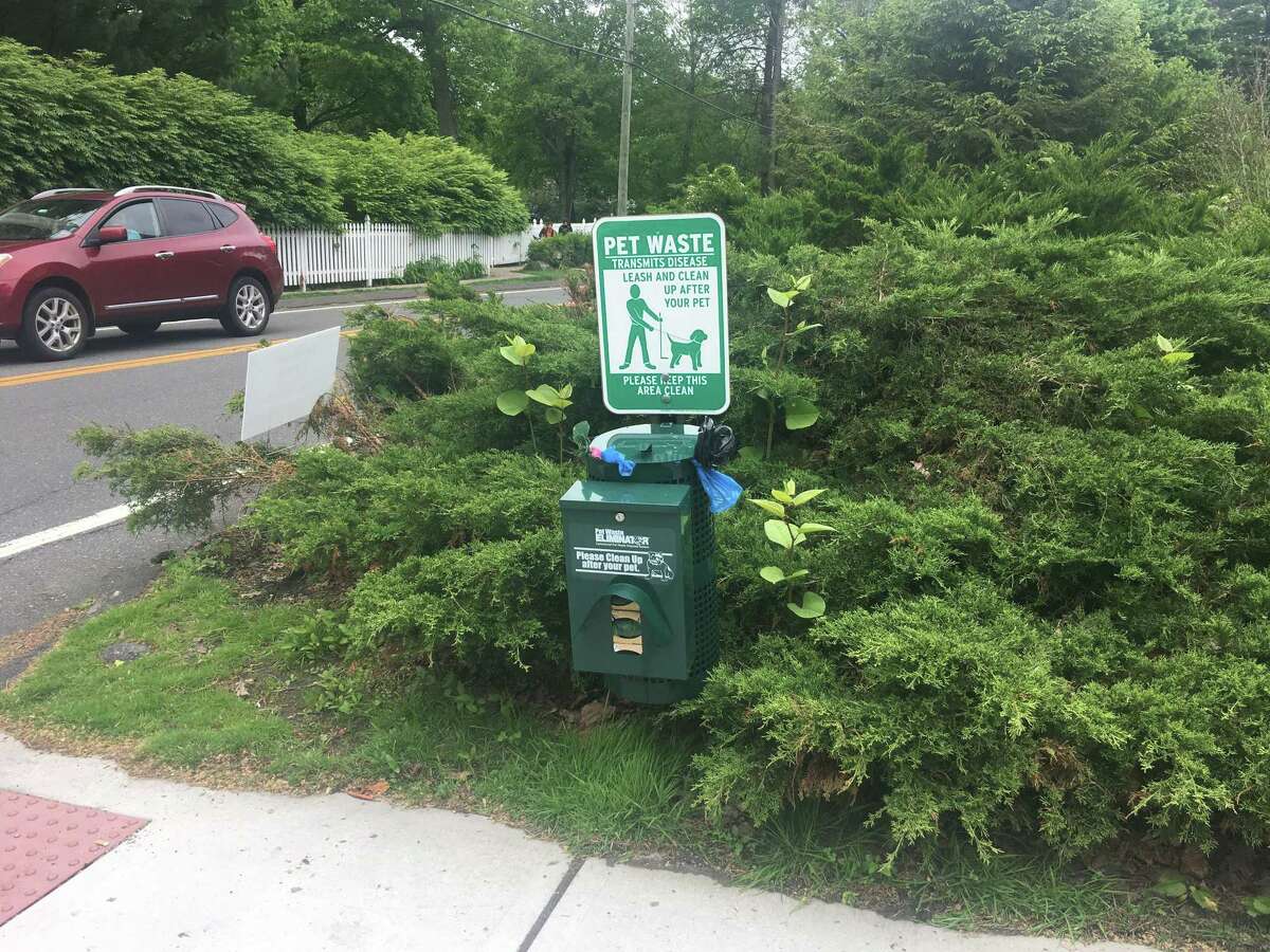 Ridgefield’s dog poop station at the intersection of Branchville Road and Main Street continues to draw the ire of residents.