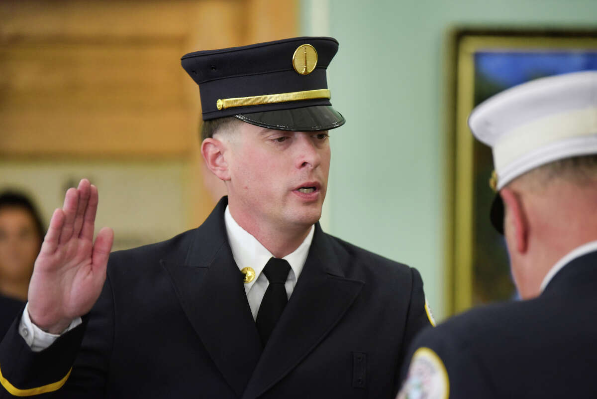 Russell Coonradt is sworn in as a Cohoes Fire Department lieutenant during a promotions and swearing-in ceremony at Cohoes City Hall on Wednesday, Aug. 28, 2019, in Cohoes, N.Y. (Paul Buckowski/Times Union)