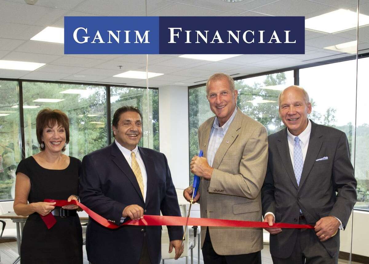 From left, Valerie Koch, VP/COO of Ganim Financial, Lawrence Ganim, CEO of Ganim Financial, Mayor Mark A. Lauretti and Bill Purcell, executive director of the Greater Valley Chamber of Commerce.