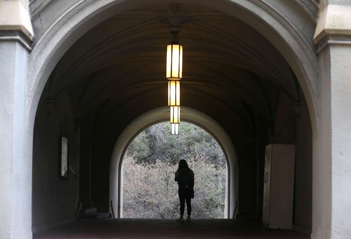 A student walks through the portico of Stephens Hall at UC Berkeley on Wednesday, Aug. 28, 2019. Stephens Hall is among six structures that have been rated as "very poor" in a seismic analysis of buildings on the campus.