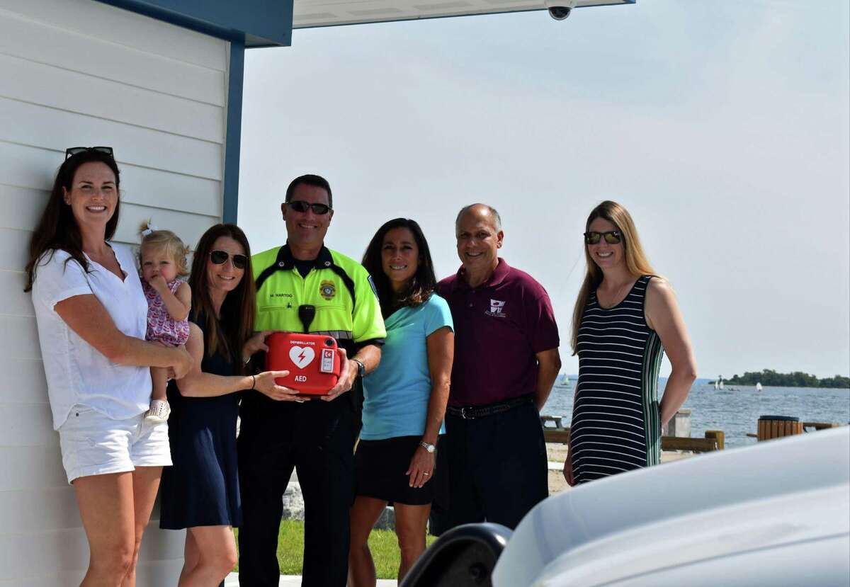 From left ,Kings Highway Elementary School teacher Kate Romano, Assistant Principal Tracey Carbone, Westport Parks & Recreation Director Jennifer Fava, Parks & Recreation Deputy Director, and teacher Tara Doyle recently presented an automated external defibrillator to Westport EMS Deputy Director Marc Hartog, center.