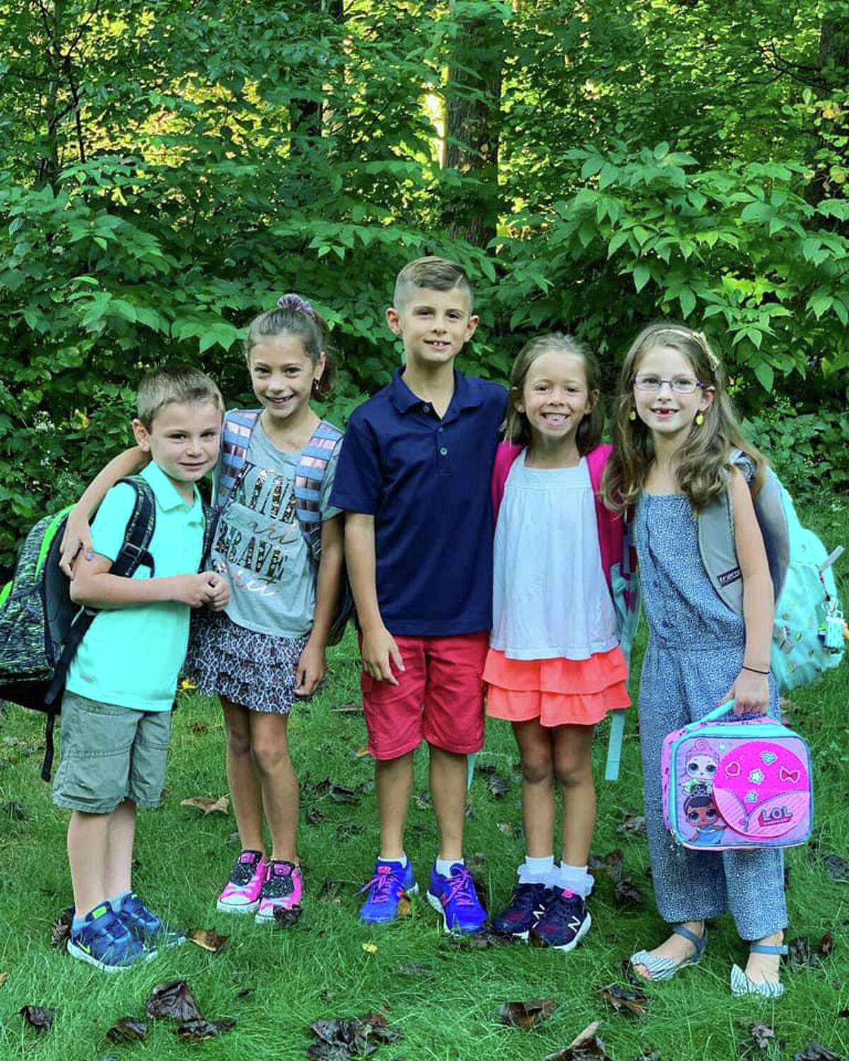 It's a neighborhood back-to-Booth Hill School morning.