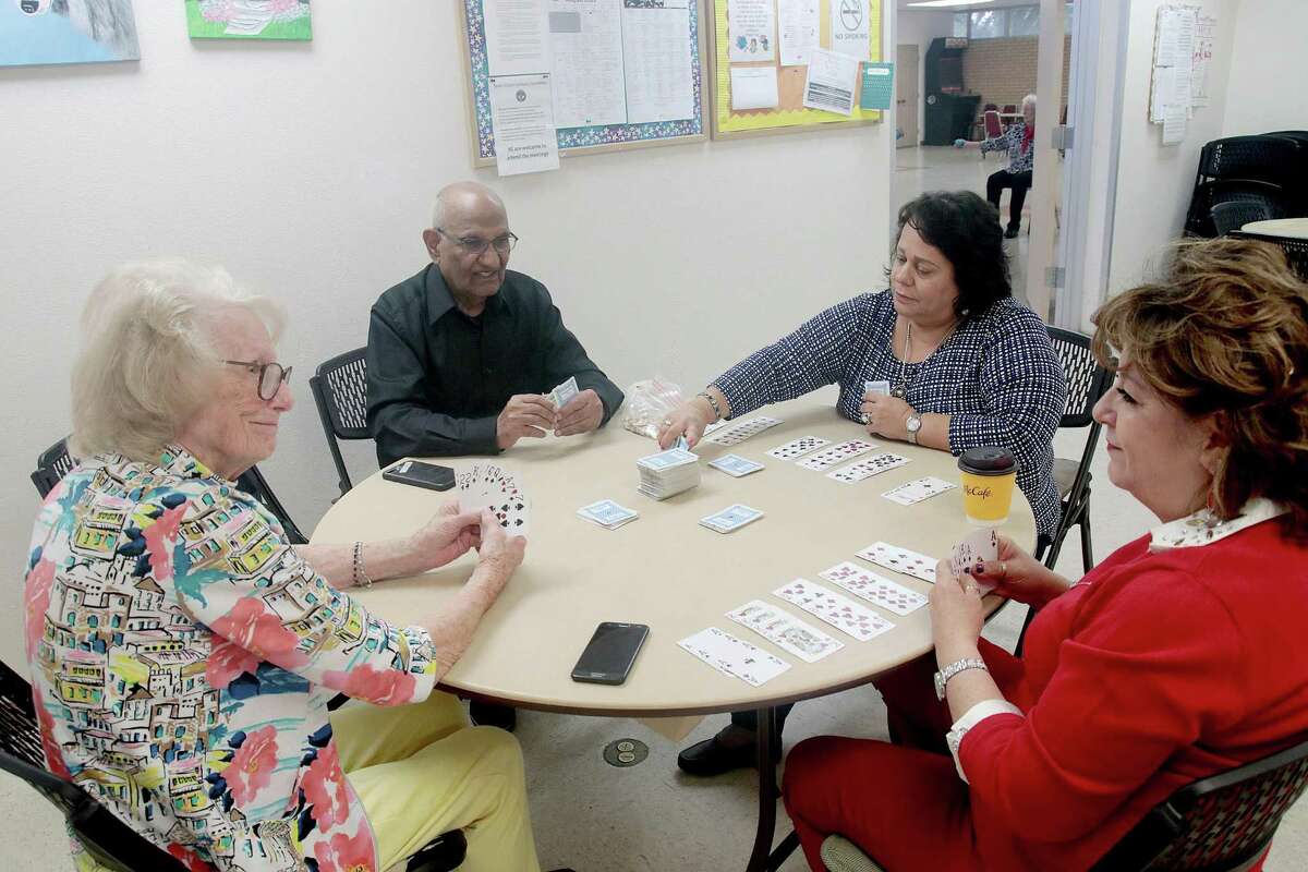 Heleene Sireci, left, Jaipal Chugh, Jenie Balderaz and Sandra Garcia enjoying a game of cards at the city of Friendswood’s activity center.