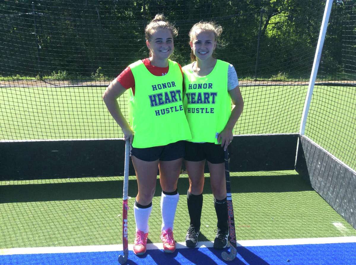 Morgan Smith, left, and Sydney Gallop are senior captains on the Sacred Heart Greenwich field hockey team.