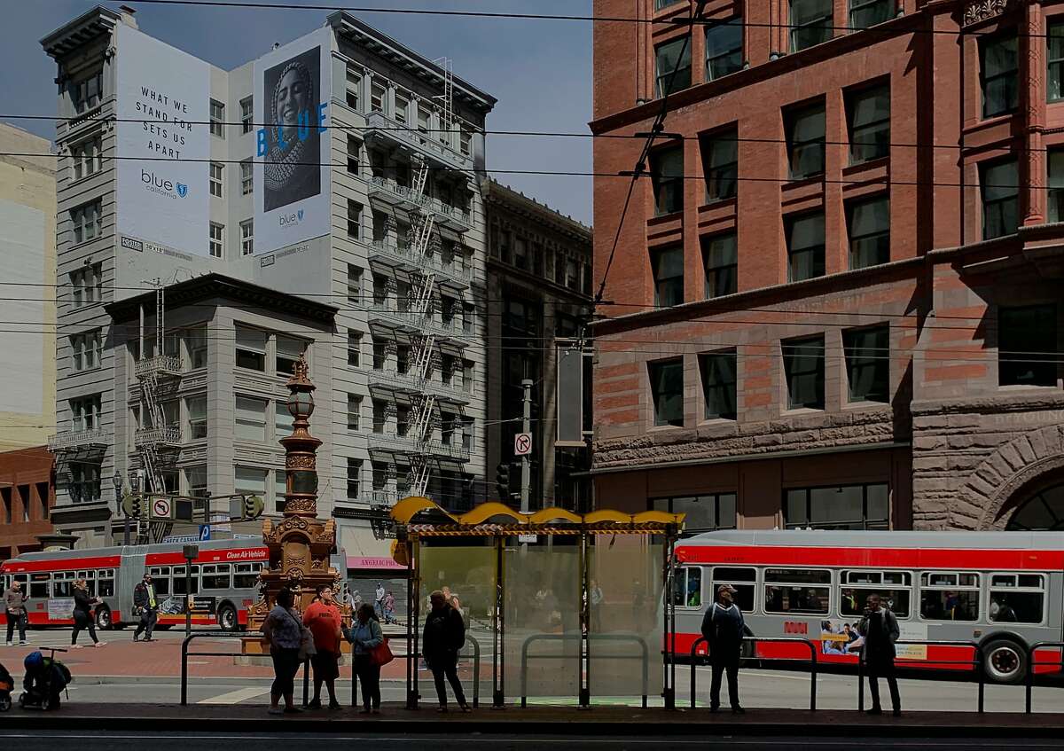 Riders wait for a train on the Muni platform at Market and New Montgomery streets in San Francisco, Calif. Thursday, July 23, 2019.