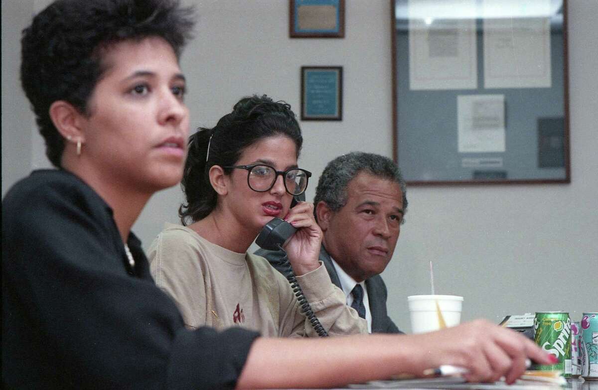 Staff at U.S. Rep. Mickey Leland's downtown Houston office monitors news about the missing congressman on television, Aug. 8, 1989.
