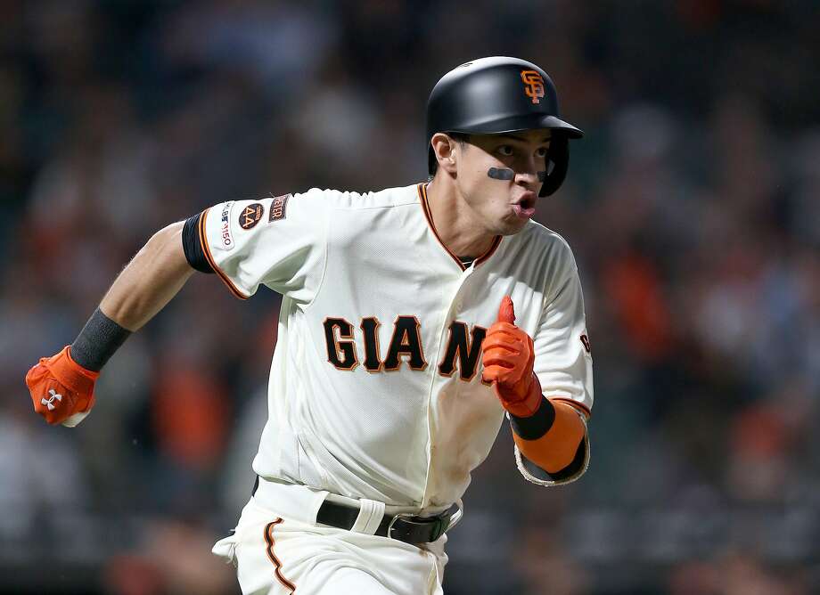 Mauricio Dubon, No. 19 San Francisco Giants, goes to first base for a single for his first major league success in the fifth inning of their San Diego Padres match at Oracle Park on August 29, 2019 in San Francisco , in California. Photo: Ezra Shaw / Getty Images