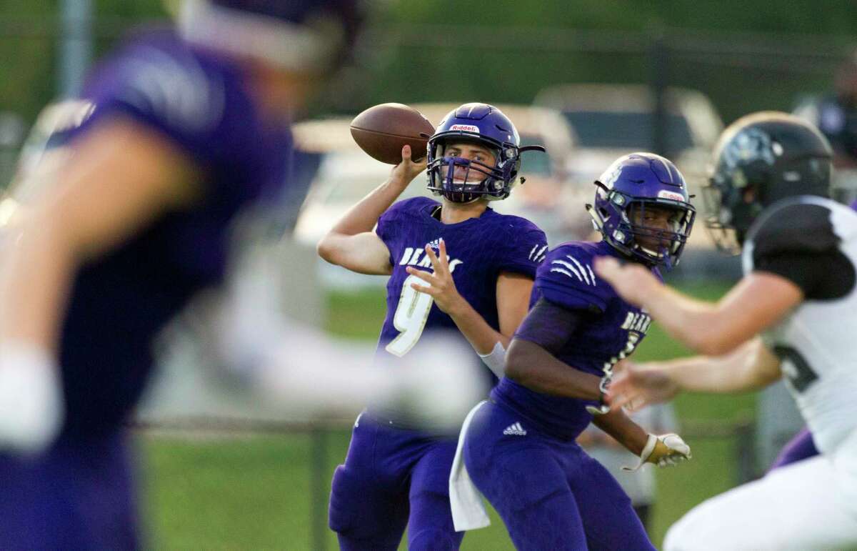 Montgomery quarterback Brock Bolfing (9) drops back to pass during the second quarter of a non-district high school football game at Montgomery ISD Stadium, Thursday, Aug. 29, 2019, in Montgomery.