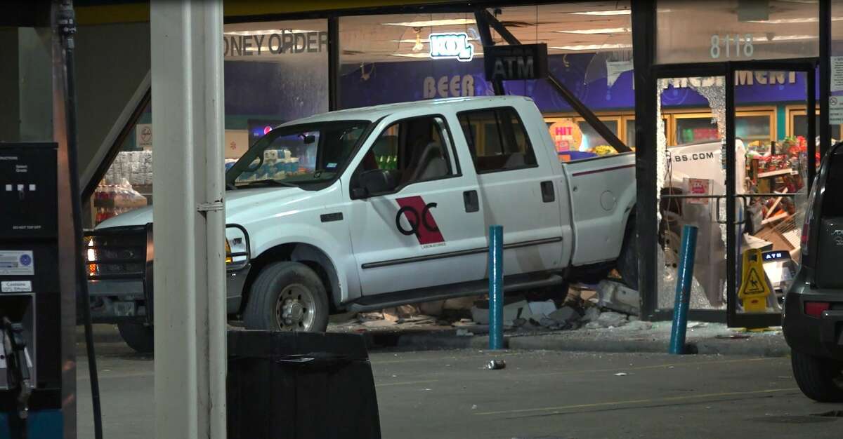 Houston police are searching for several suspects they said purposefully crashed into a south Houston service station to steal an ATM but fled when the clerk began shooting at them.