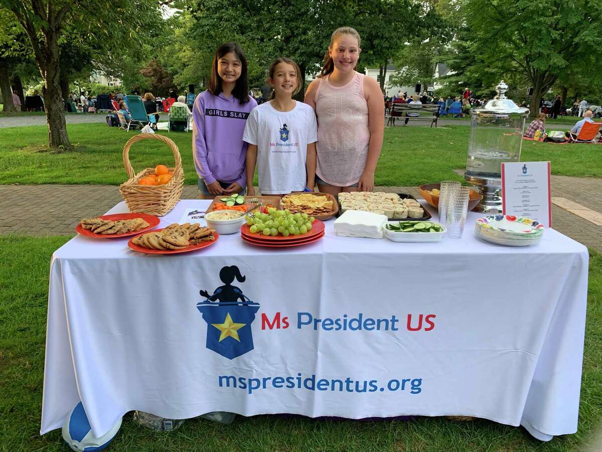 The three winners from last school year’s Ms. President US competition celebrated at the final Tuesday CHIRP concert in Ballard Park on Aug. 27. The Ms. President US winners are, left to right: Sophia Aguilar (entering seventh grade), Juliette Arencibia (entering sixth), and Kyela McGuire (entering seventh).