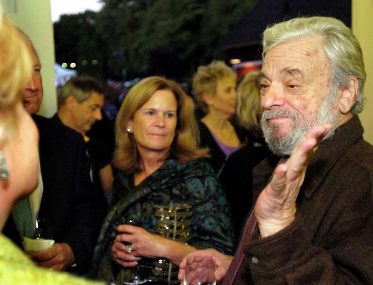 Westport_092506_Steven Sondheim: Noted composer Steven Sondheim appeared at the Westport Country Playhouse as part of the organizations' annual gala event. A tribute to his work was presented on stage while Sondhiem himself mixed and mingled before hand with supporters. Here he chats with some, including (center) Robin Harvey of Darien. by Paul Desmarais/ Staff Photo: SPORTS Staff Photo Paul Desmarais