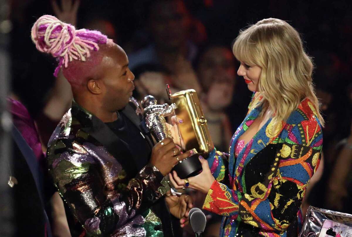 Todrick Hall, left, and Taylor Swift accept the video for good award for "You Need to Calm Down" at the MTV Video Music Awards at the Prudential Center on Monday, Aug. 26, 2019, in Newark, N.J.