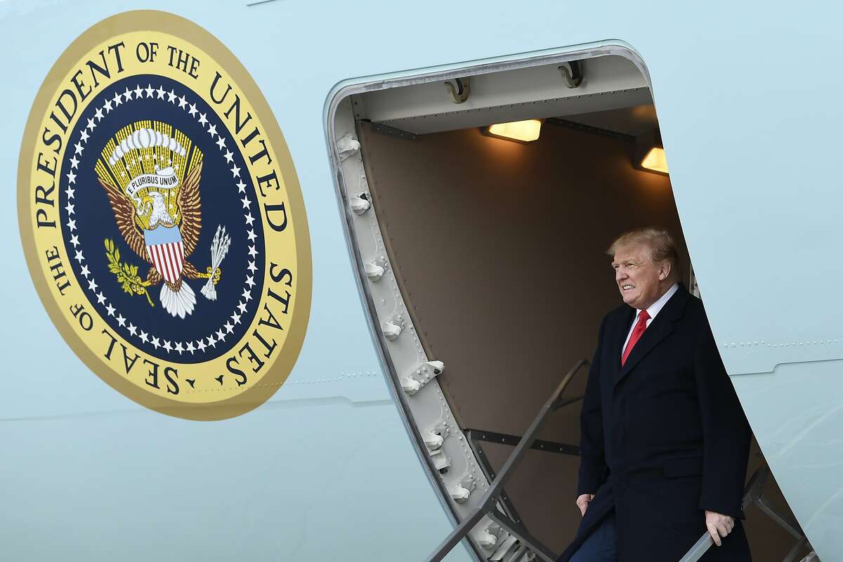 FILE - In this April 15, 2019, file photo, President Donald Trump walks down the steps of Air Force One at Andrews Air Force Base in Md. Four California voters have sued Monday, Aug. 5, 2019, to block a new state law aimed at forcing Republican President Donald Trump to release his personal income tax returns. Democratic Gov. Gavin Newsom signed a law last week that requires presidential candidates to file five years of their income tax returns with the California Secretary of State at least 98 days prior to the primary election. Candidates who don't do it won't appear on the ballot. (AP Photo/Susan Walsh, File)
