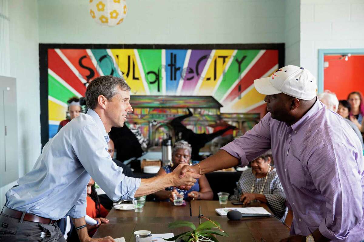 Beto O'Rourke shakes hands with Waki Wynn at a roundtable discussion during a campaign stop in Charlottesville, Virginia on Saturday, August 31, 2019. (Ryan M. Kelly for the San Antonio Express-News)