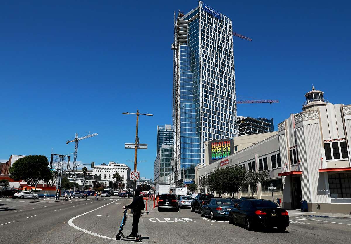 Facing South Van Ness, the crane seen on the left side of the frame is located at 98 Franklin and the 400 foot tower seen in the center is located at 1500 Mission, photographed in San Francisco, Calif., on Friday, August 30, 2019. 1500 Mission is expected to open in March 2020.