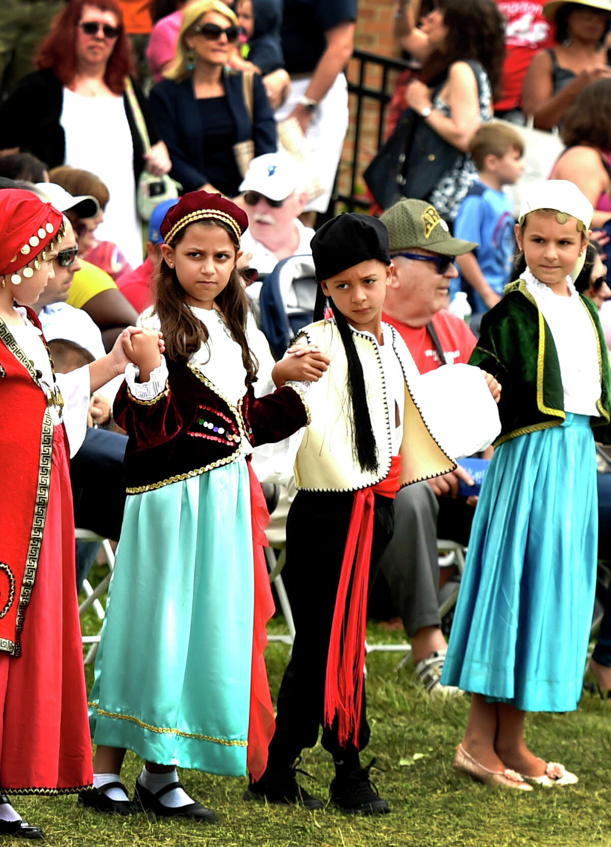 Orange, Connecticut - Sunday, September 1, 2019: Members of the Junior Odyssey Dancers, ages 7-10, perform during the St. Barbara Greek Orthodox Church 39th Annual Greek Festival Odyssey 2019 Sunday in Orange. The Labor Day weekend 4-day event of Hellenic traditions include all types of Greek culinary delights cooked on the festival grounds, Greek dancing and dance lessons, music, Greek cooking demonstrations, a gourmet Greek grocery, presentations on Greek Orthodoxy, a tag sale, children's activities rides, games and magic shows.