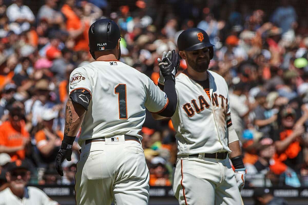 SAN FRANCISCO, CA - SEPTEMBER 01: Kevin Pillar #1 of the San Francisco Giants is congratulated by Evan Longoria #10 after hitting a two run home run against the San Diego Padres during the first inning at Oracle Park on September 1, 2019 in San Francisco, California. (Photo by Jason O. Watson/Getty Images)