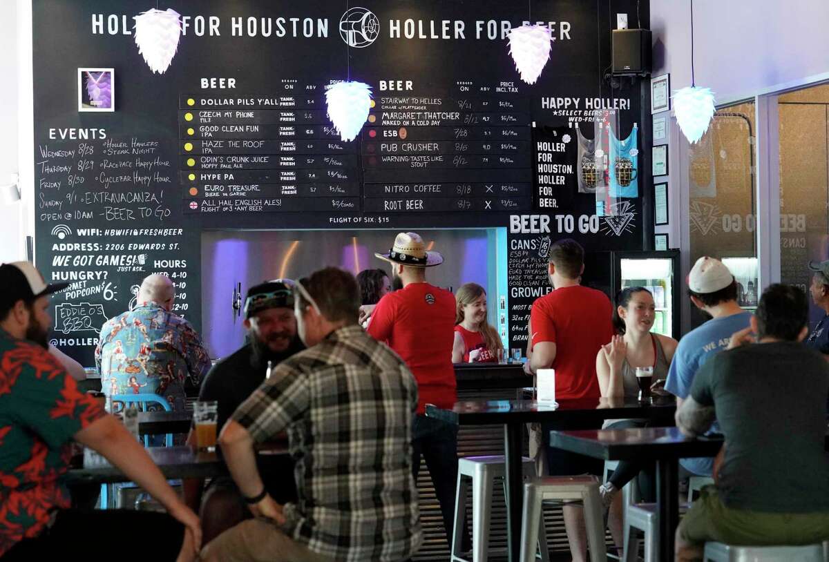 Houston beer enthusiasts eagerly take their suds to go for the first time