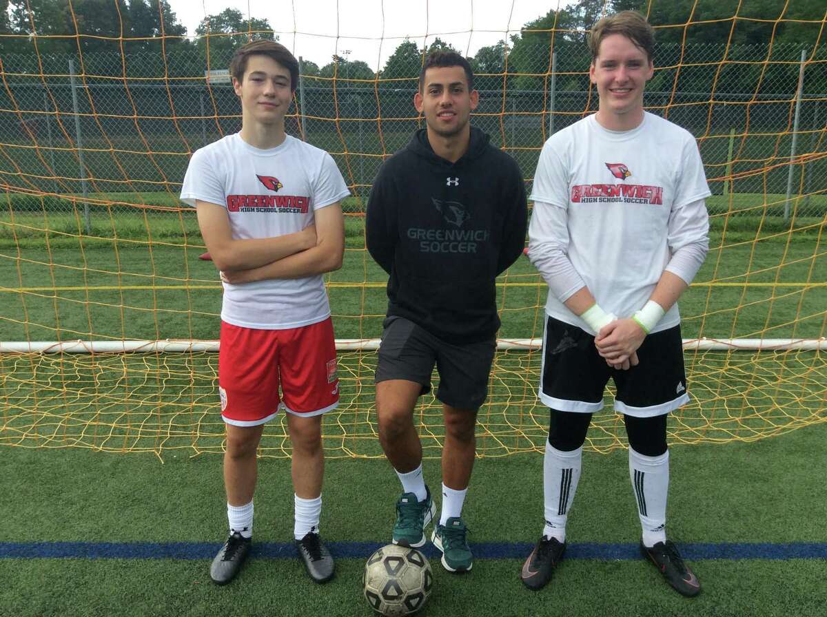 From left to right, Max Pisacreta, Davi Pedreiro and Padraig Colligan are senior captains on the Greenwich boys soccer team.